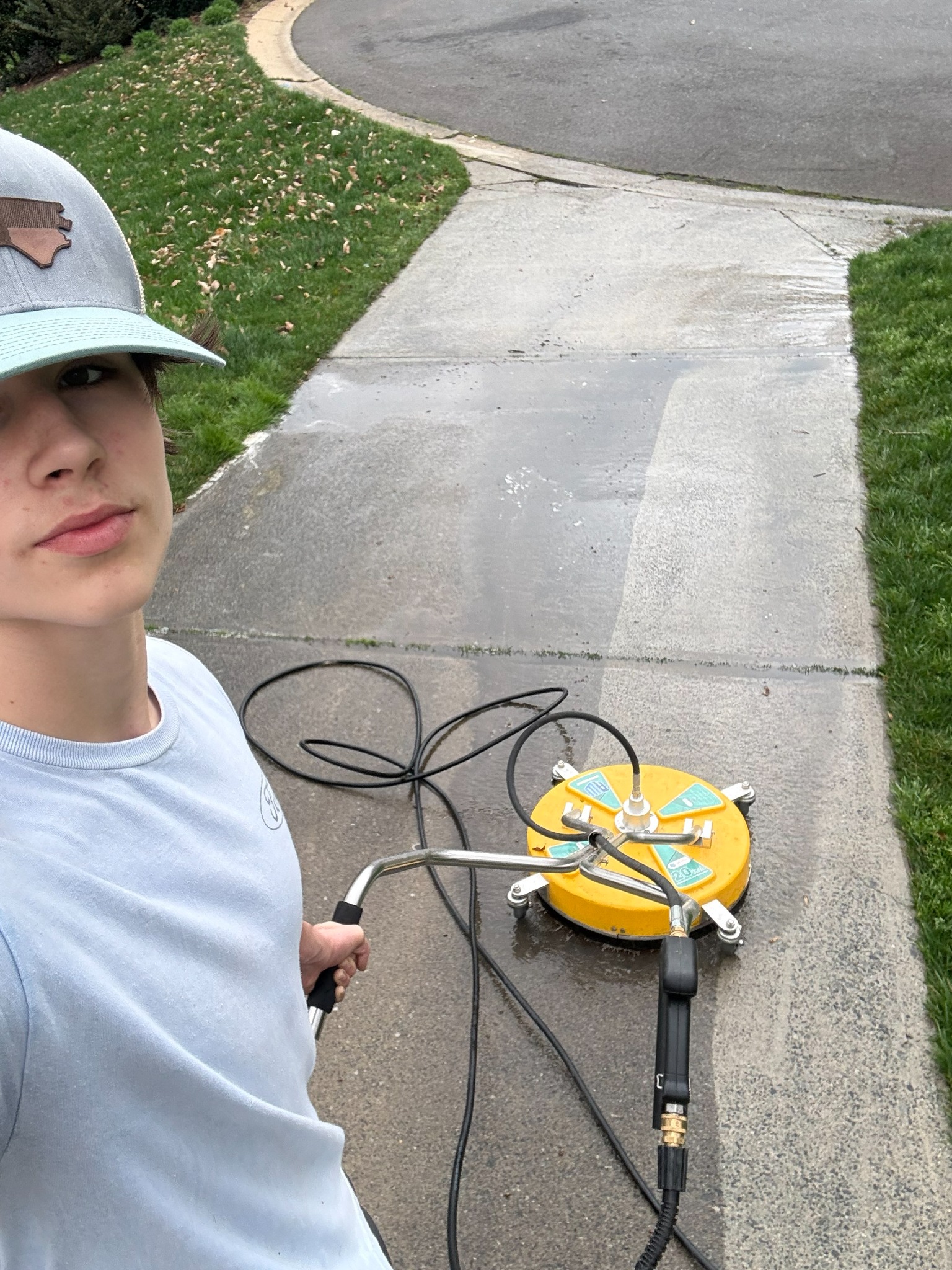Liam of G-Man's Pressure Washing at work